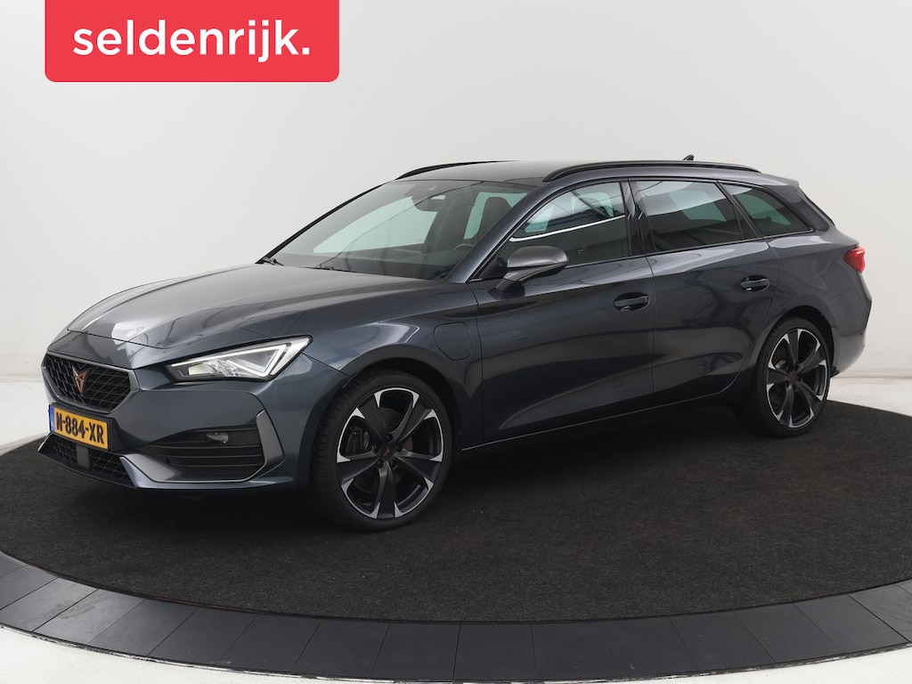 CUPRA Leon 1.4 e-Hybrid VZ Business | 245pk | SOH 92% | Trekhaak | Carplay | Adaptive cruise | Sportstoelen | Navigatie | Stuurverwarming | Parkeerhulp | Full LED | Sfeerverlichting | Keyless | PHEV | Plug In