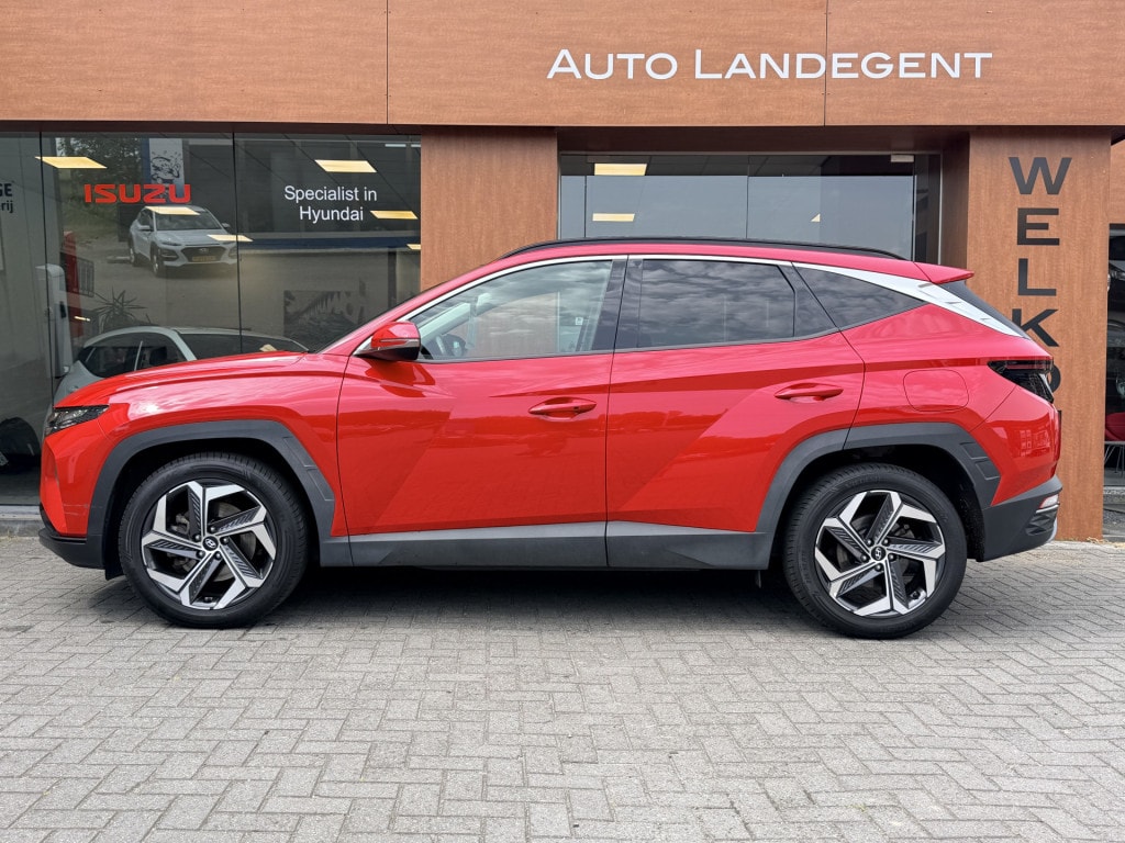 Hyundai Tucson 1.6 T-GDI HEV Comfort Plus Sky | Schuif/Kanteldak | Trekhaak | Add. Cruise control