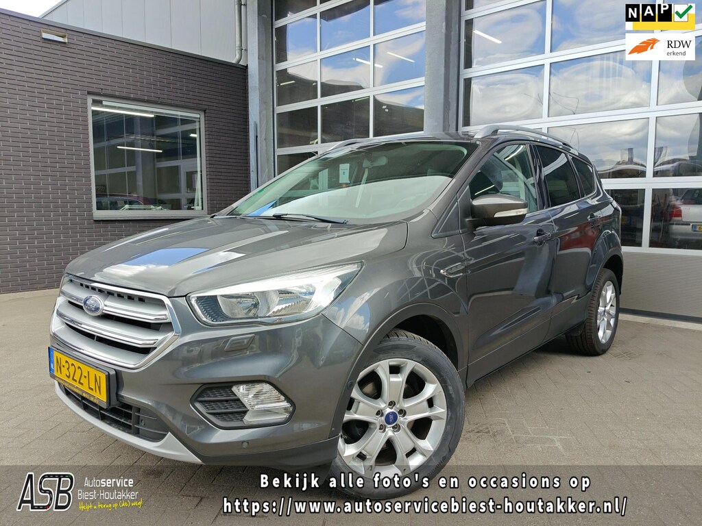Ford Kuga 1.5 EcoBoost Titanium | Carplay | Keyless | Trekhaak | Cruise + Climate Control | Sensoren V +A + Camera | Parkeerhulp