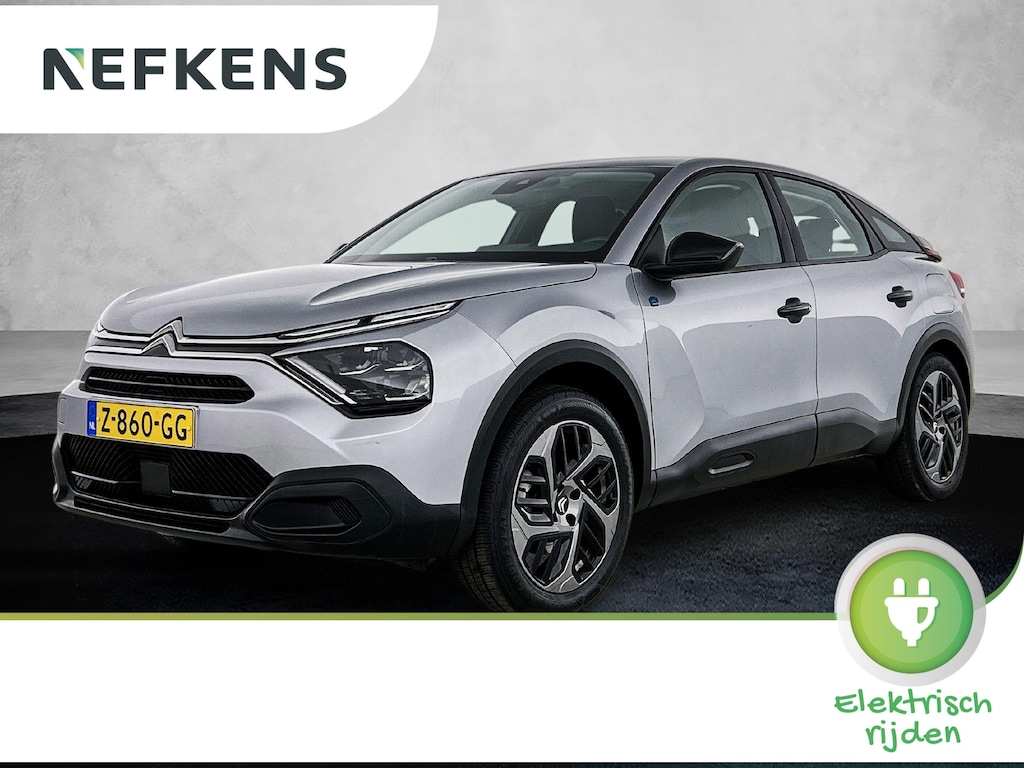 Citroën E-C4 You 50 kWh 136pk | Accu 97% | Navigatie via Apple Carplay / Android Auto | Achteruitrijcamera | Climate Control | Cruise Control | Parkeersensoren | DAB+ radio | Armsteun | Stof/kunstlederen comfortstoelen | Volledig digitaal instrumentenpaneel | Adaptief demping systeem | 18” lichtmetalen velgen |