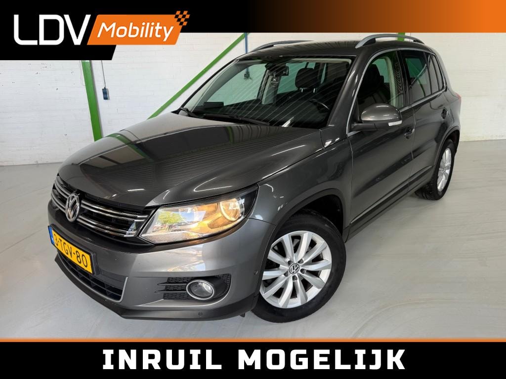 Volkswagen Tiguan 1.4 TSI Sport &amp; Style / Trekhaak / Park assist / PCD Voor &amp; Achter / Navi / Bluetooth / Historie aanwezig.
