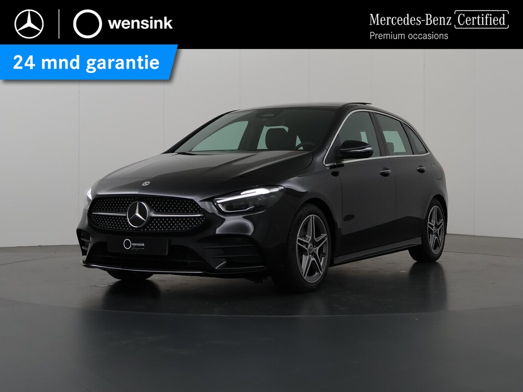 Mercedes-Benz B-klasse 180 Business Solution AMG | Panoramadak | Winter pakket | Memory stoelen | Trekhaak | Parkeercamera | Sfeerverlichting |