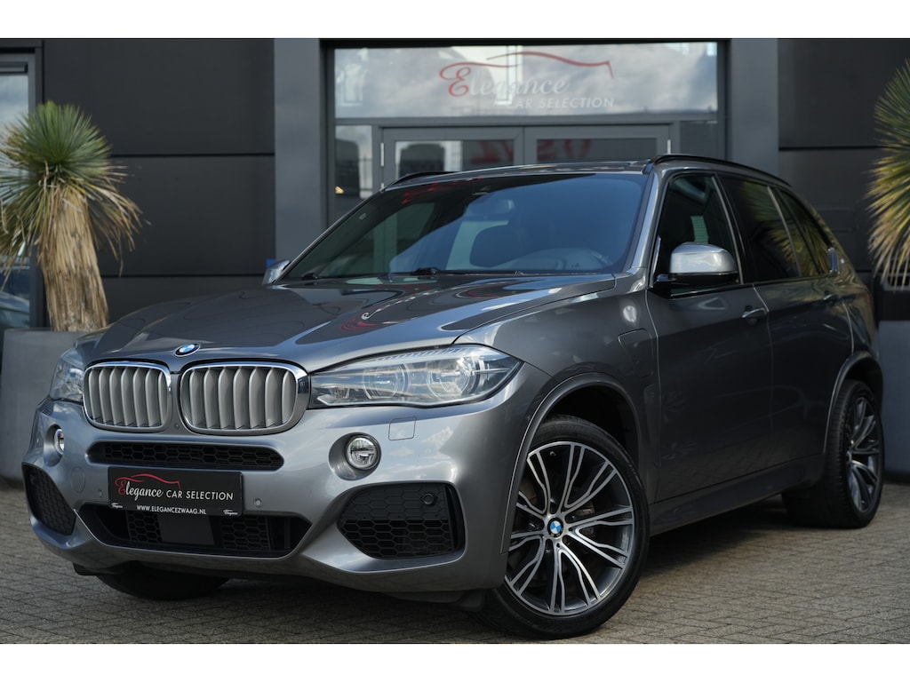BMW X5 xDrive40e iPerformance M Sport Edition | 313PK | Pano | Trekhaak | Harman Kardon | HUD | 360° | 20" | Luchtvering | BMW X5 xDrive40e iPerformance M Sport Edition 313 PK Plug-in Hybrid met 2.0 viercilinder, panoramadak, trekhaak, Harman Kardon High End Sound, Head-Up Display, 360° camera, 20-inch M lichtmet