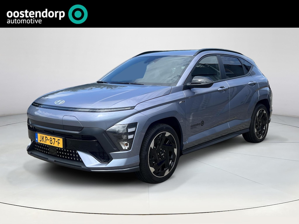 Hyundai Kona Electric N Line Business 64.8 kWh | Demo voordeel! | Adaptieve Cruise Control | Parkeersensoren voor en achter | Dodehoekdetectie | Navigatie | Stoel / Stuurverwarming | Keyless entry en start| Uit Voorraad Leverbaar |