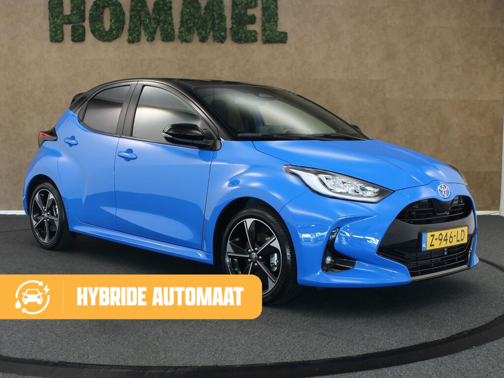 Toyota Yaris 1.5 Hybrid 130 Launch Edition - ORIGINEEL NEDERLANDSE AUTO - AFKOMSTIG VAN 1E EIGENAAR - DEELS LEDEREN BEKLEDING - PARKEERSENSOREN VOOR/ ACHTER - NAVIGATIE - HEAD UP DISPLAY - STUUR EN STOELVERWARMING - 17 INCH LICHT METALEN VELGEN - JBL AUDIO - DODEHOEK DETECTIE