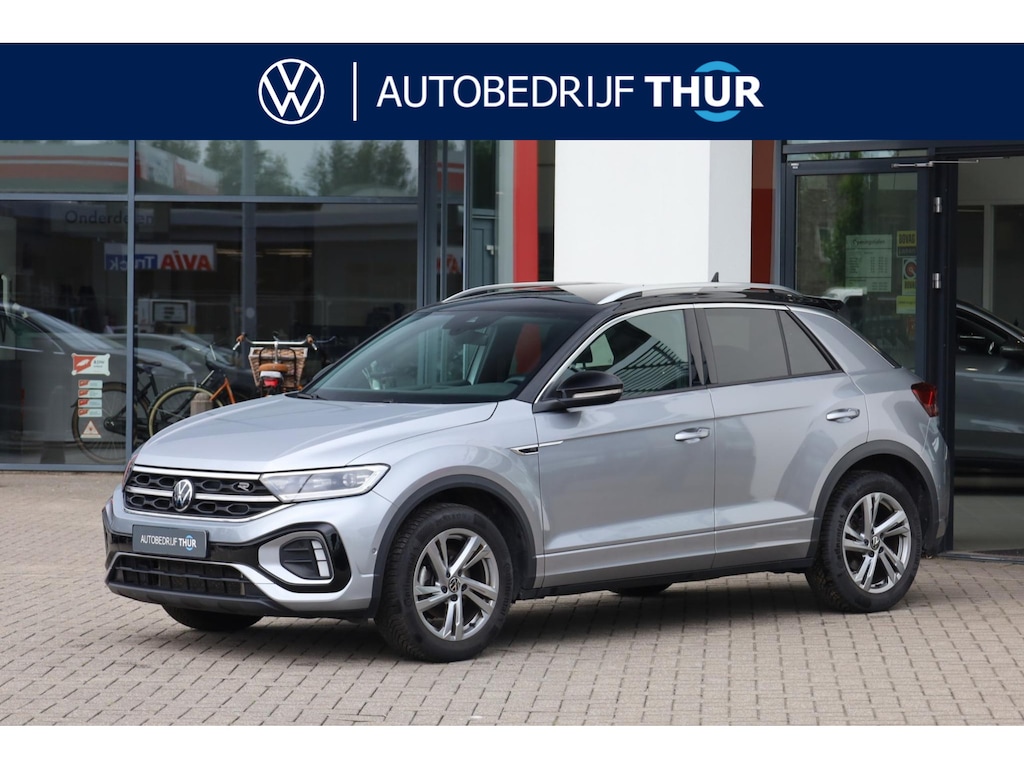 Volkswagen T-Roc 1.5 TSI R-Line 150PK / 110kW DSG, Trekhaak, R-Line in- en exterieur, ErgoActive bestuurdersstoel met massagefunctie, verwarmbare voorstoelen, achteruitrijcamera (Rear View), navigatie, elektrisch verstel-, verwarm- en inklapbare buitenspiegels, parkeerassistent (Park Assist), grootlichtassistent (Light Assist), LED plus koplampen, adaptieve cruise control (ACC), licht- & regensensor, 2-zone climatronic, draadloos Apple Carplay & Android Auto, ambiente verlichting, 17" 'Valencia' LMV, DAB+, parkeersensoren voor en achter (PDC)