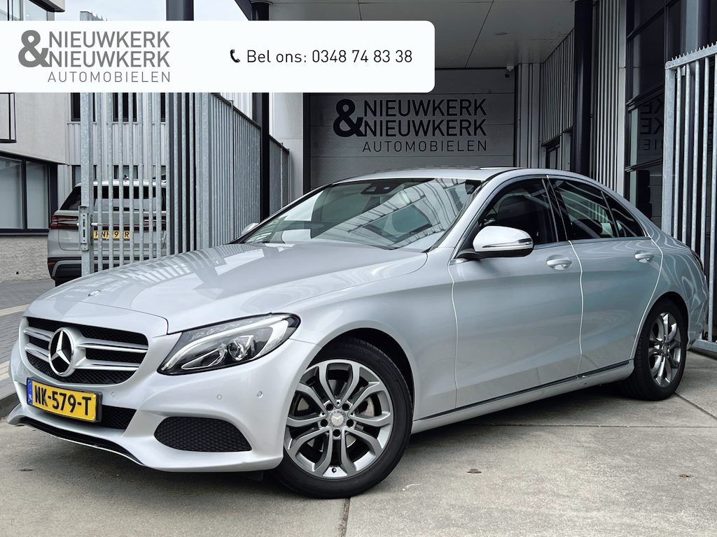 Mercedes-Benz C-klasse 180 Prestige | AUTOMAAT | SCHUIF/KANTELDAK | CAMERA | NAVI | CRUISE CONTROL | PDC V+A | CLIMATE CONTROL | LMV 17'' | STOELVERWARMING | BLUETOOTH