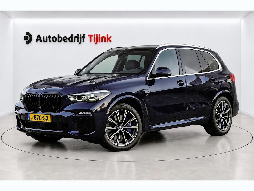 BMW X5 xDrive45e High Executive M-Sport | Luchtvering |  Elek. trekhaak | Safety pack | Achterasbesturing | HUD | M aerodynamica | Leder |