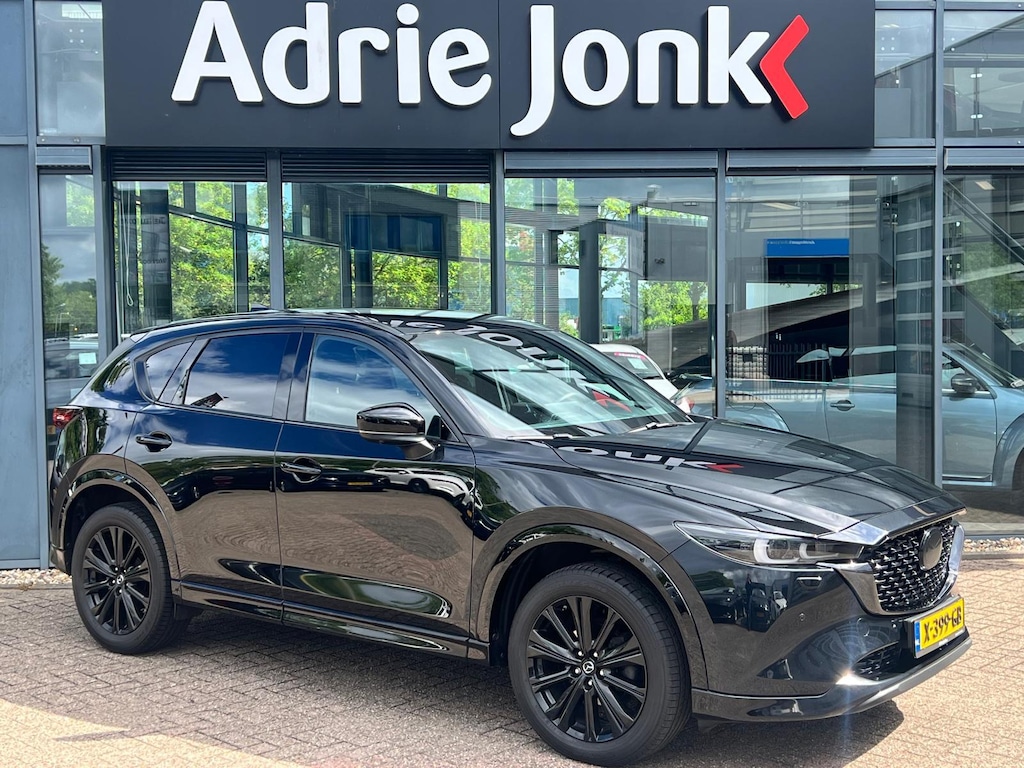 Mazda CX-5 2.0 SkyActiv-G 165 Homura AUTOMAAT | TREKHAAK | 360gr CAMERA | APPLE CARPLAY/ANDROID AUTO | HEAD-UP DISPLAY | STOEL- en STUURVERWARMING | NAVIGATIE |