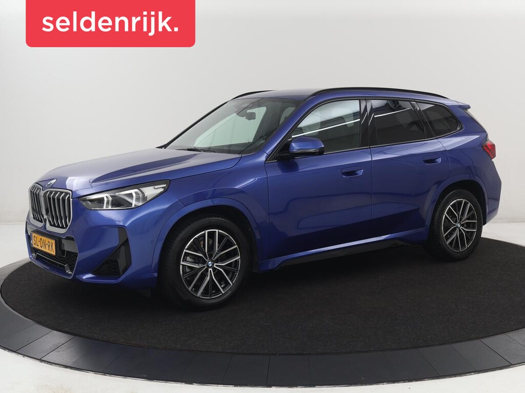 BMW X1 M Sport | xDrive23i | Adaptive Cruise | Trekhaak | Head-Up | Leder | 360 camera | Stoelverwarming | Keyless | Adaptief LED | Carplay | Sportstoelen | Live Cockpit Professional | 204pk