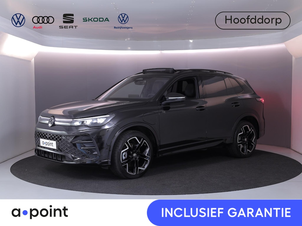 Volkswagen Tiguan 1.5 eHybrid R-Line Edition | Private lease vanaf €907 | 272 pk Automaat (DSG) | Verlengde garantie | Navigatie | Panoramadak | Trekhaak (wegklapbaar) | Parkeersensoren (Park assist) | Rondomzicht camera | Lederen bekleding | Stoelverwarming/ventilatie |
