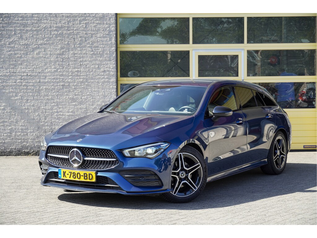 Mercedes-Benz CLA Shooting Brake 180 Automaat! AMG Business Solution BJ2020 Lmv 18" | Led V+A | Pdc | Sideskirts | Elek. achterklep | Achteruitrijcamera | Navi | Virtual cockpit | Climate control | Cruise control | Sportstoelen | Sportstuur | Verwarmde voorstoelen | Zwarte hemel