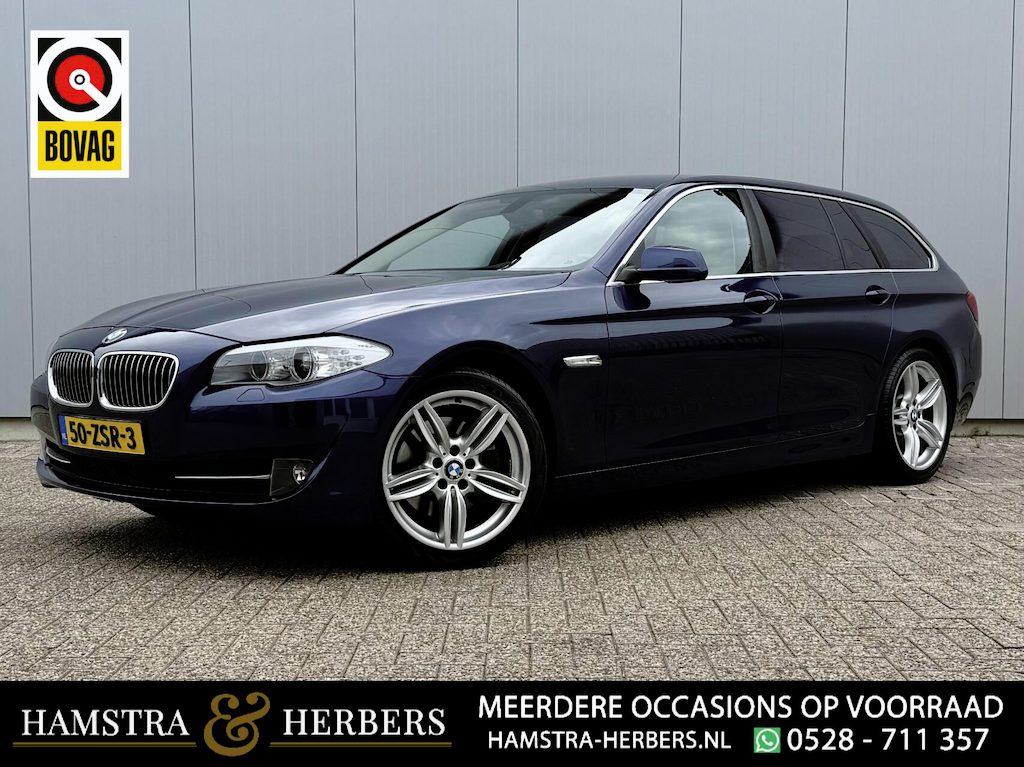 BMW 5-Serie Touring 528xi Executive blauw