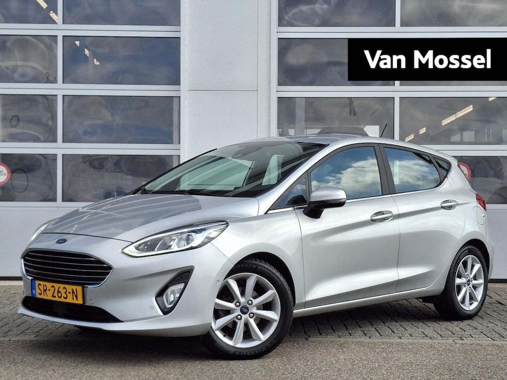 Ford Fiesta 1.0 EcoBoost Titanium | Trekhaak | Adaptieve Cruise Control | 16'' LMV | Voorruitverwarming | Achteruitcamera | Climate Control | B&O Premium Sound | Parkeersensoren V+A |