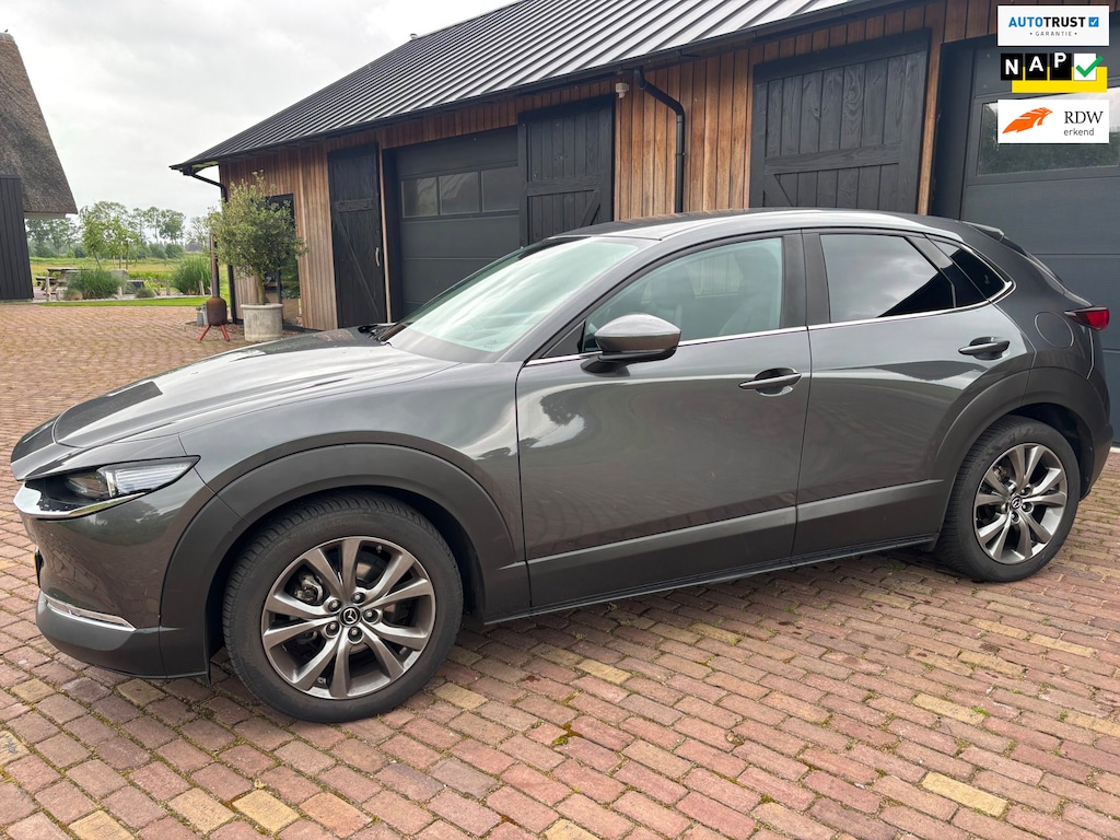 Mazda CX-30 2.0 e-SkyActiv-X M Hybrid Luxury ,CAMERA ,HUD,MEMORY STOELEN, TREKHAAK.