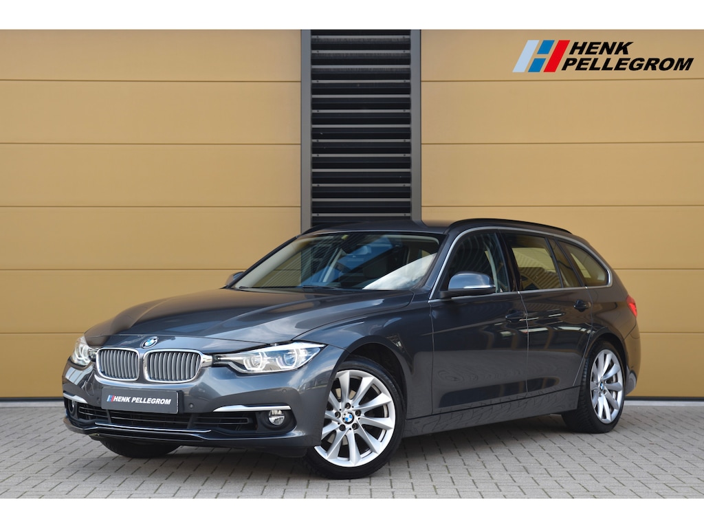 BMW 3-Serie Touring 318i Executive * Luxuryline * Hifi * Sportstoelen * Camera * Navigatie Proffesional *