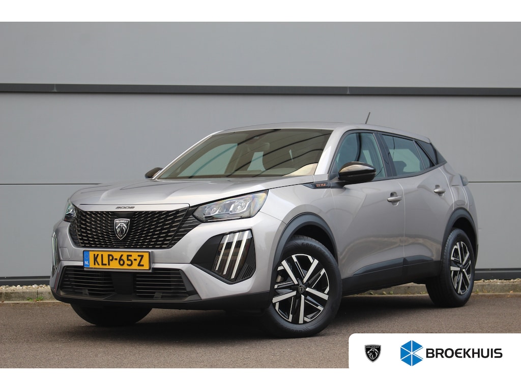 Peugeot 2008 1.2 Hybride Style Aut. | Carplay | Airco | Cruise | Pdc | Centrale deurvergrendeling | | Carplay | Airco | Cruise | Pdc | Centrale deurvergrendeling |