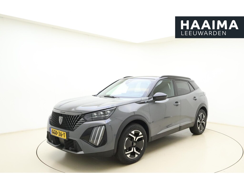 Peugeot e-2008 EV GT 54 kWh | Achteruitrijcamera | Dakrails | Cruise control | Climate control | Navigatie | Stof/lederen bekleding | 16" lichtmetalen velgen | Apple/Android carplay | 400km WLTP | 100% Elektrisch