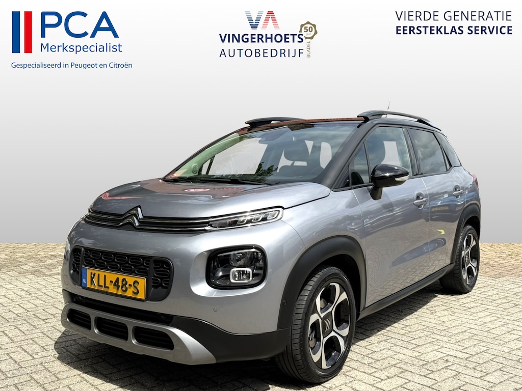 Citroën C3 Aircross 130 Pk Benzine * AUTOMAAT * Luxe Shine * Navigatie * Stoelverwarming * Distributieriem 2026 vervangen * Parkeer Camera + Voor- en Achter Sensoren * 17" L.M. Velgen * DAB Radio * Climate & Cruise Control * Zwart Dak * Keyless Start Vingerhoets; Vierde Generatie Eersteklas Service. Al meer dan 100 jaar een begrip in de Brabantse Kempen