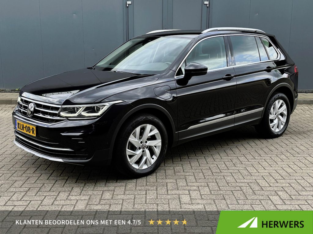 Volkswagen Tiguan 1.4 TSI eHybrid Elegance Business+ / Electrische achterklep / Dealer onderhouden / Elektrische trekhaak (1800 kg) / Accu SoH 94.4 % / Navigatie / Apple Carplay Android / Stuur- en stoelverwarming / Parkeer assistent / 18" LM wielen /