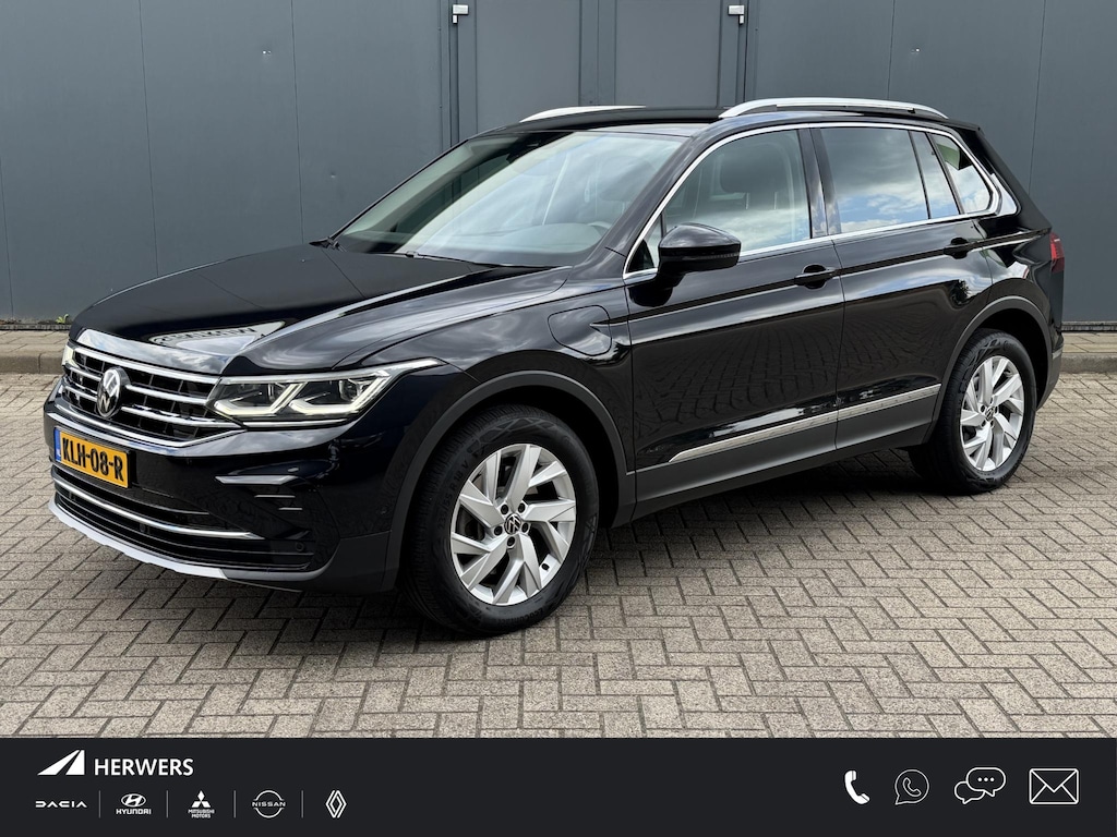 Volkswagen Tiguan 1.4 TSI eHybrid Elegance Business+ / Dealer onderhouden / Elektrische trekhaak (1800 kg) / Accu SoH 94.4 % / Navigatie / Apple Carplay Android / Stuur- en stoelverwarming / Parkeer assistent / 18" LM wielen /