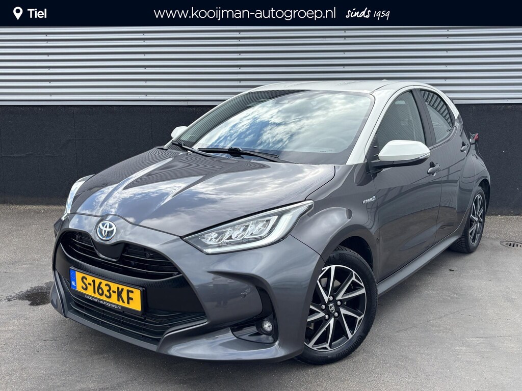 Toyota Yaris 1.5 Hybrid Executive Bi-tone edition Navigatie, Dodehoekdetectie, HUD, Parkeersensoren voor + achter, LED, Smart Key, Adaptieve cruise control