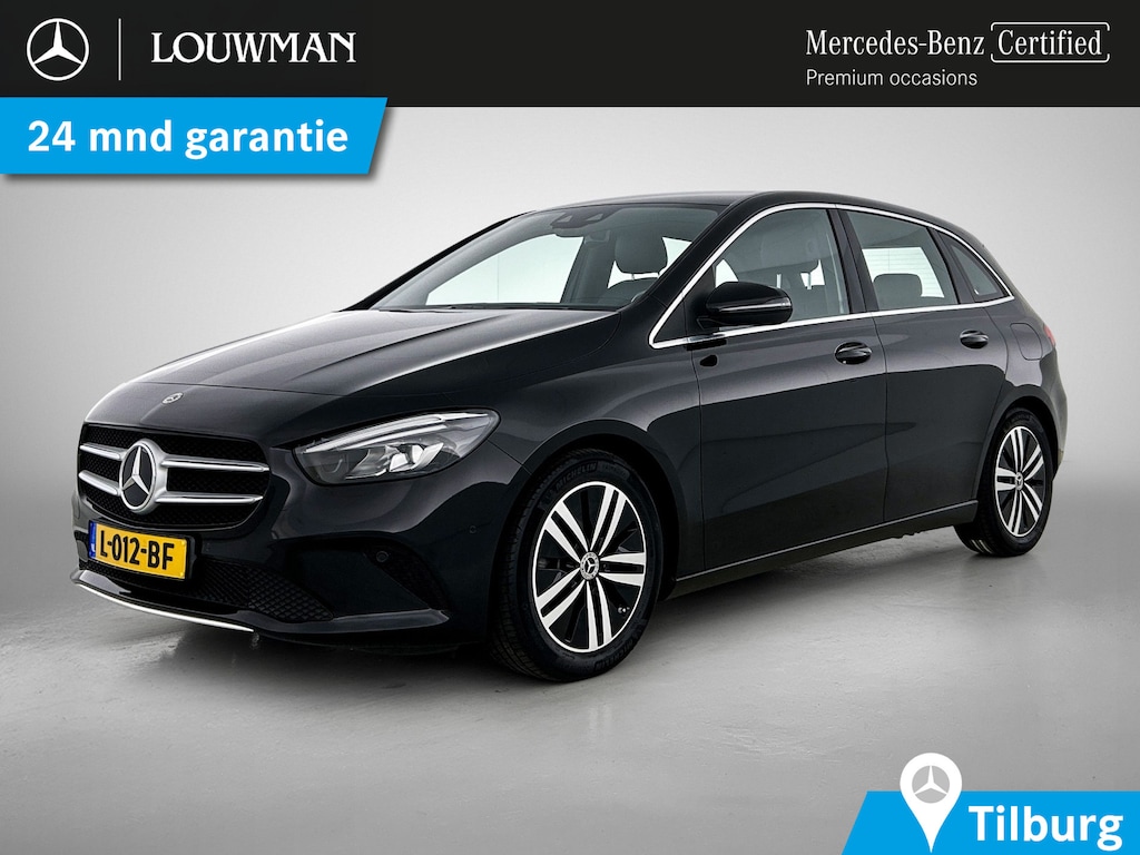 Mercedes-Benz B-klasse 180 Business Solution Luxury Trekhaak | Parkeerpakket met achteruitrijcamera | Ledkoplampen | Sfeerverlichting | Stoelverwarming. Inclusief 24 maanden MB Certified garantie voor Europa.