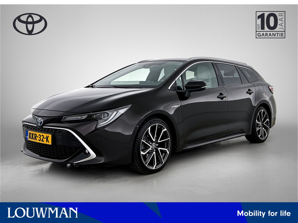 Toyota Corolla Touring Sports 2.0 Hybrid Premium | Schuif/kantel dak | JBL | Head-Up Display | dodehoek detectie | Stoel+stuurverwarming | Parkeersensoren voor+achter met assistent | Elektrische achterklep |