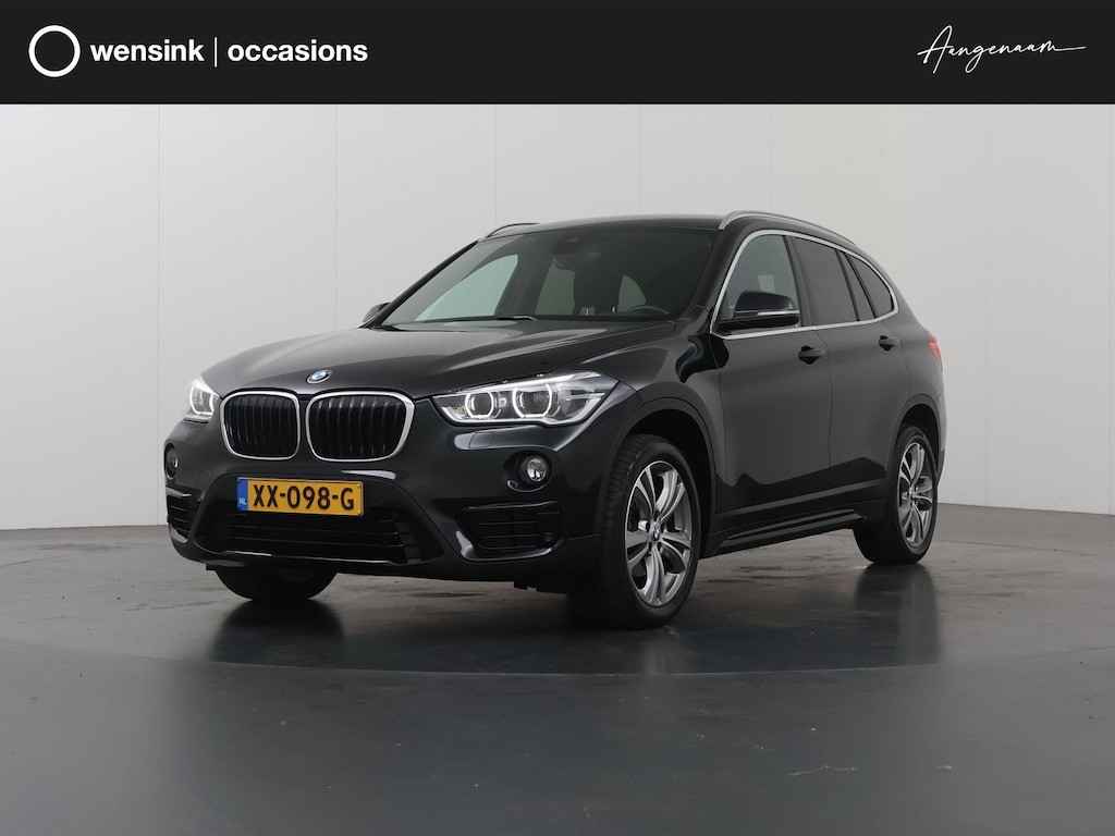 BMW X1 sDrive18i Executive Sport Edition | 1700kg trekgewicht | Trekhaak | Stoelverwarming | HUD | Navigatie | Cruise control | Achteruitrijcamera | Sportstoelen |