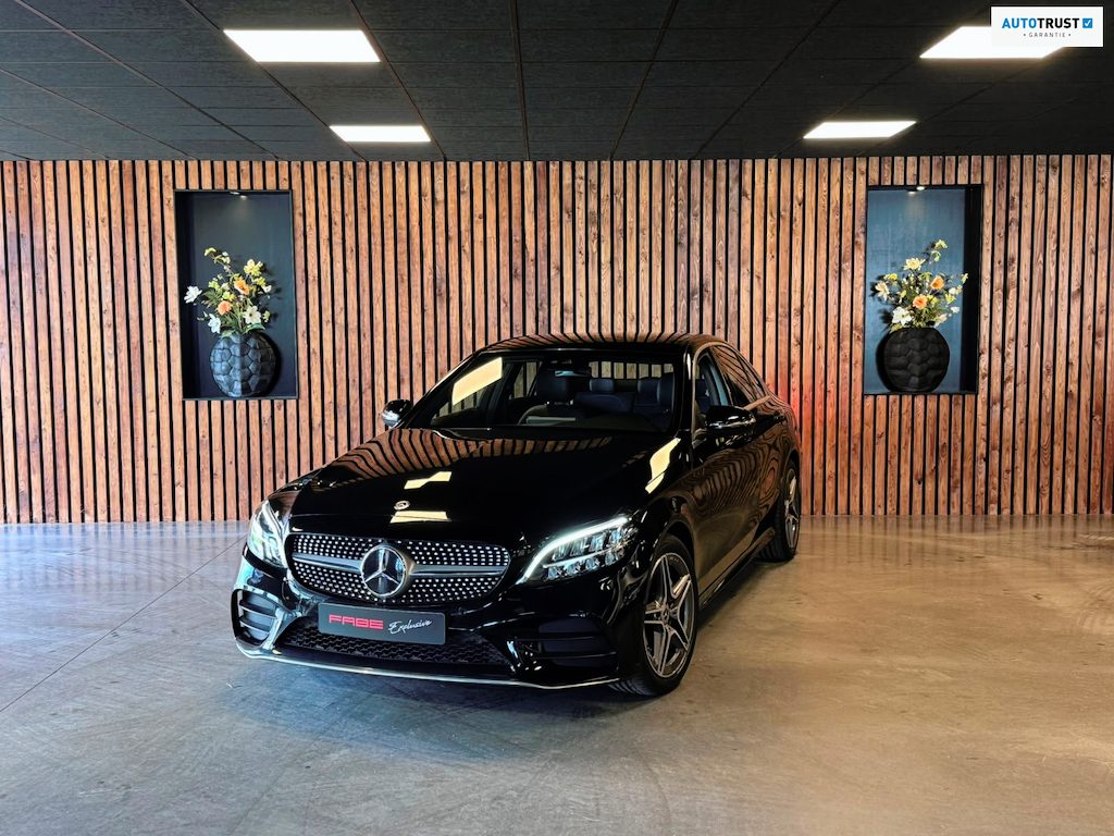 Mercedes-Benz C-klasse 180 Business Solution AMG / Virtual / Carplay / Stoelverwarming / Sfeerverlichting / Trekhaak / ACC /