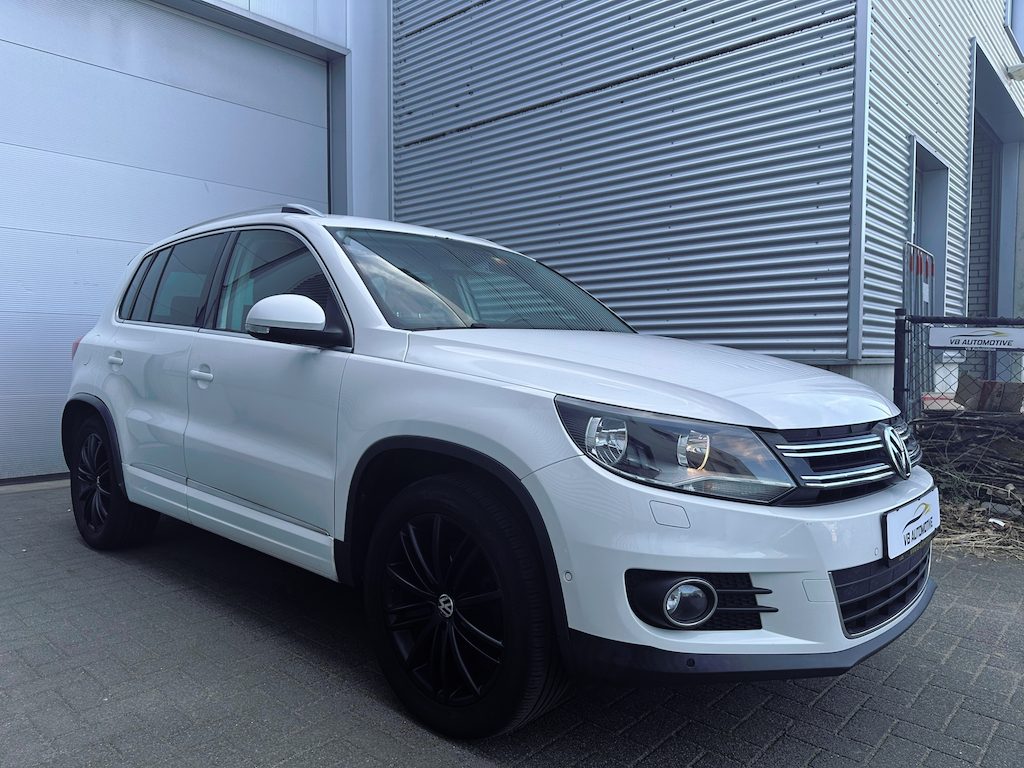 Volkswagen Tiguan 2.0 TSI 4Motion |Dsg|Leer|Cruise|Stoelvw|2xpdc|Navi|Nwe apk