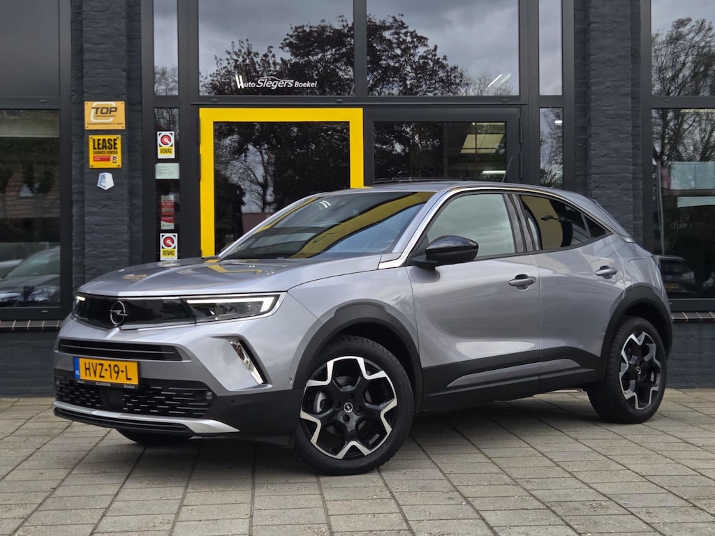 Opel Mokka 1.2 Ultimate | Alcantara Bekl | Camera | Park Sens. V + A | Stuur- en Stoelverwarming | Android Auto en Apple Carplay |