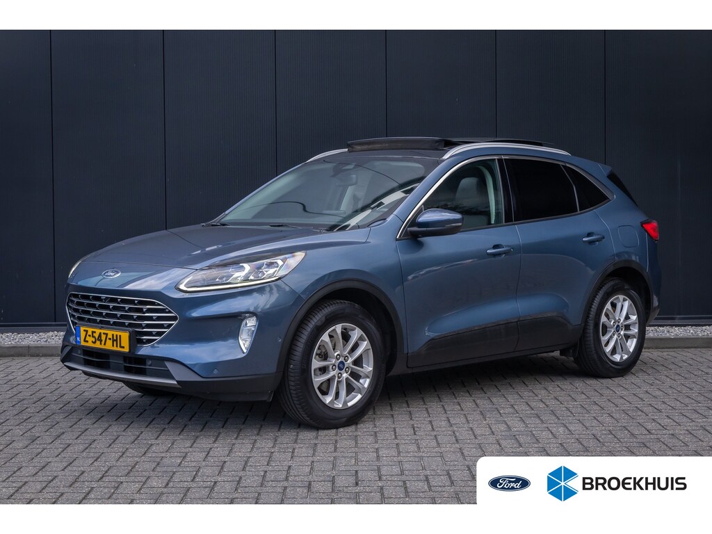 Ford Kuga 1.5 EcoBoost Titanium X | 100% dealer o.h. | Panoramadak | Adaptieve cruise | Trekhaak | Privay glass | Helf leder | B&O Audio | Camera  | 1800kg trekgewicht