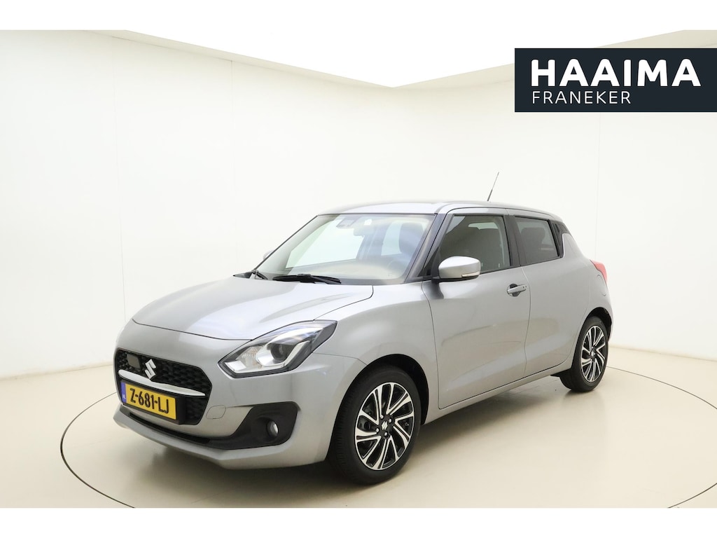 Suzuki Swift 1.2 Style Smart Hybrid 83pk | Navigatie | Climate Control | Cruise Control | Stoelverwarming | Camera | Lichtmetalen Velgen | Apple Carplay - Android Auto