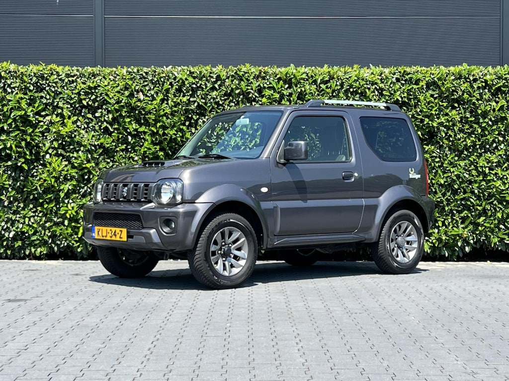 Suzuki Jimny 1.3 Exclusive RANGER, LEDER, AIRCO, STOELVERWARMING, TREKHAAK, LICHTMETAAL 15"
