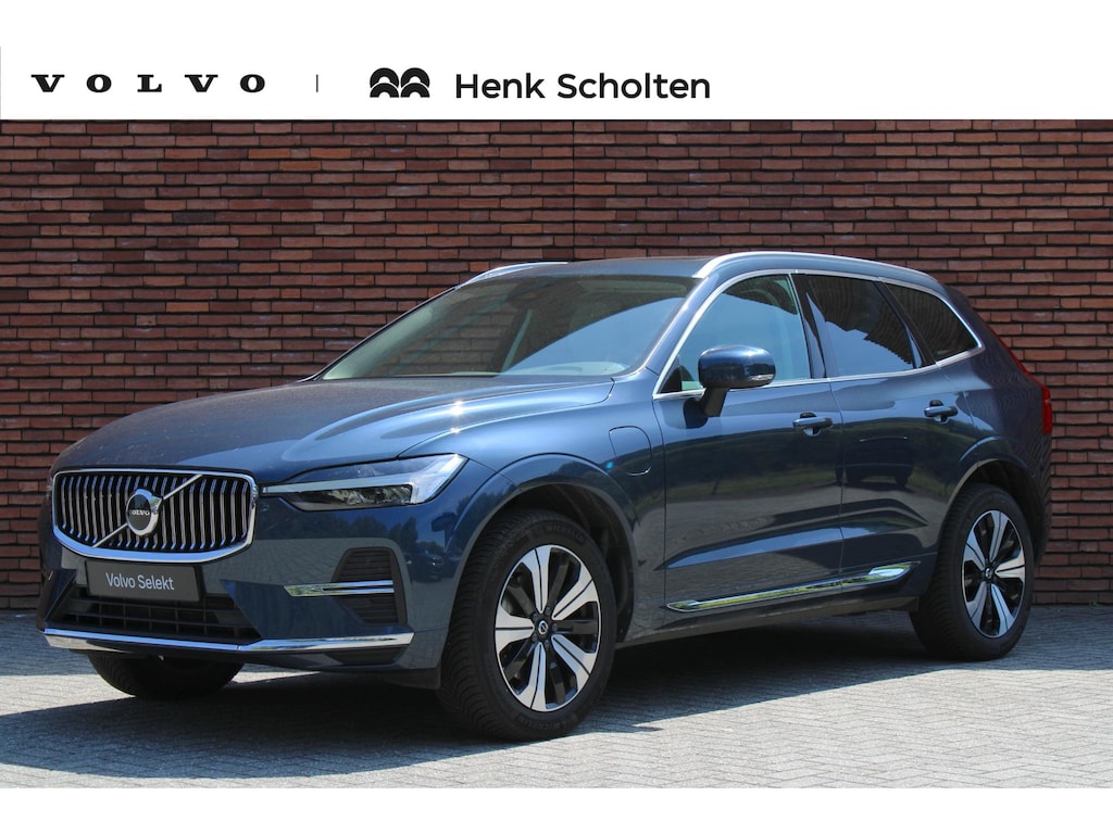 Volvo XC60 2.0 T6 Plug-in hybrid AWD Essential Bright | Stoel-/ stuurwielverwarming | Trekhaak, inklapbaar | Adaptieve Cruise control | Pilot Assist | Verwarmde achterbank | Parkeersensoren voor + achter | 19 inch. lichtmetalen velgen | All-season banden | Achteruitrijcamera | BLIS | Apple carplay/ Android auto