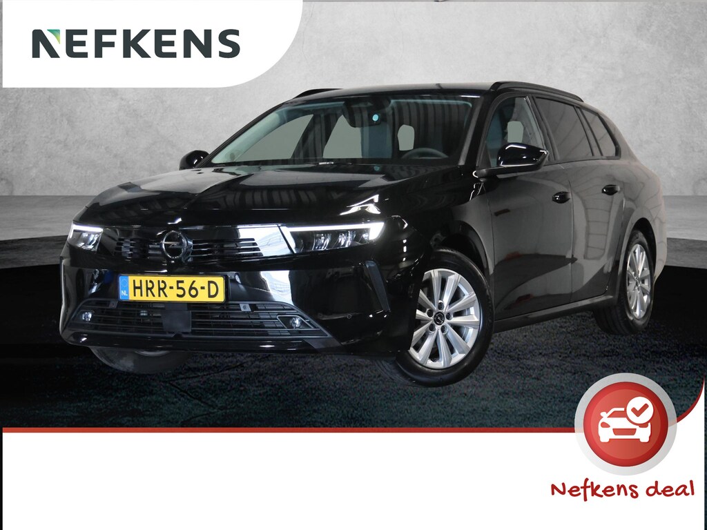 Opel Astra Sports Tourer 1.2 110PK Business Edition | 1ste eigenaar | Navigatie | Climate Control | Adaptieve Cruise Control | Achteruitrijcamera | Parkeersensoren | Stoel/Stuurverwarmd | Keyless | AppleCarplay/AndroidAuto | Isofix | Privacy Glass |