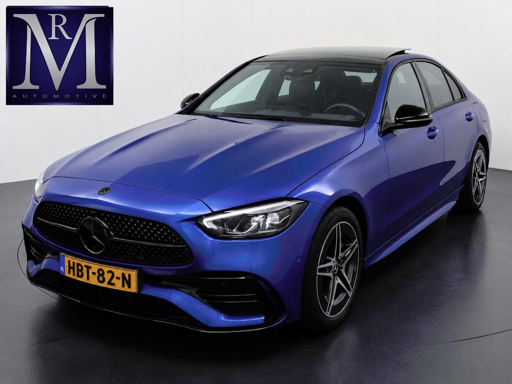 Mercedes-Benz C-klasse 300 e AMG Line Limited PHEV | PANORAMADAK | DISTRONIC (ACC) | ACHTERUITRIJCAMERA | DODEHOEKASSISTENT | AMBIENT LIGHTING | MERCEDES-DEALER ONDERHOUDEN | RIJKLAAR MET 12 MAANDEN BOVAG GARANTIE |