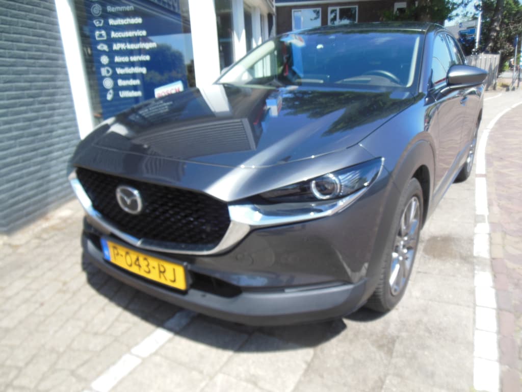 Mazda CX-30 2.0 e-SkyActiv-X M Hybrid Luxury 12 maanden Bovag garantie leer/bose/trekhaak carplay/android