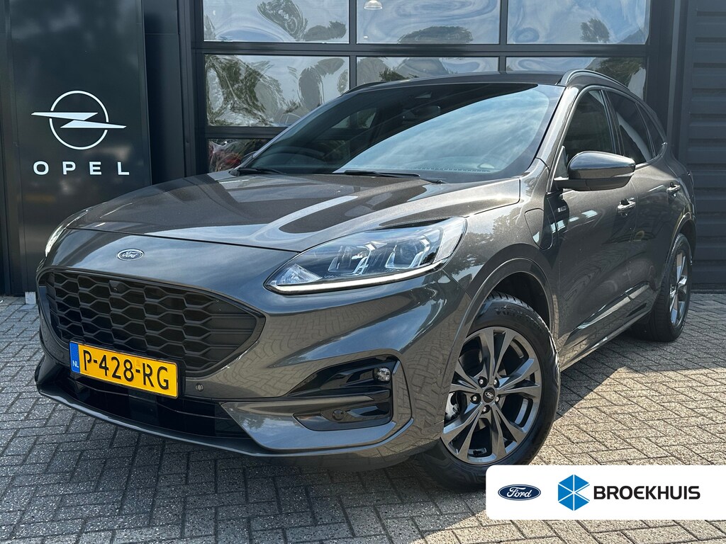 Ford Kuga 2.5 PHEV 225 PK ST-Line | AFNMB. TREKHAAK| ADAPTIEVE CRUISE CONTROL| STOEL, STUUR, VOORRUIT EN ACHTERBANKVERWARMING| DODEHOEK DETECTIE| CAMERA + PARKEERSENSOREN| DEALER ONDERHOUDEN|