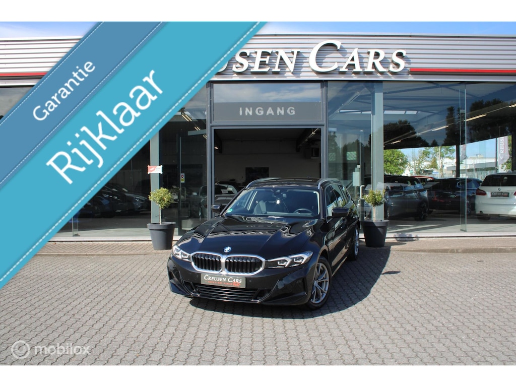 BMW 3-Serie Touring 320e xDrive/Led/Trekhaak/Navi/Tel/All seas/