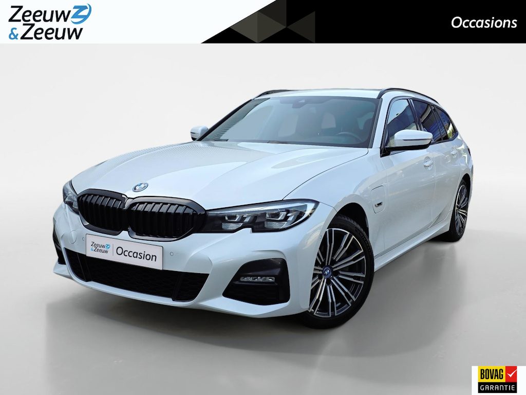 BMW 3-Serie Touring 320e Business Edition Plus | Dealer onderhouden! | 1e Eigenaar | Trekhaak | Achteruitrijcamera | Merino leder | Elektr. Achterklep | Virtual cockpit | 12 maanden garantie