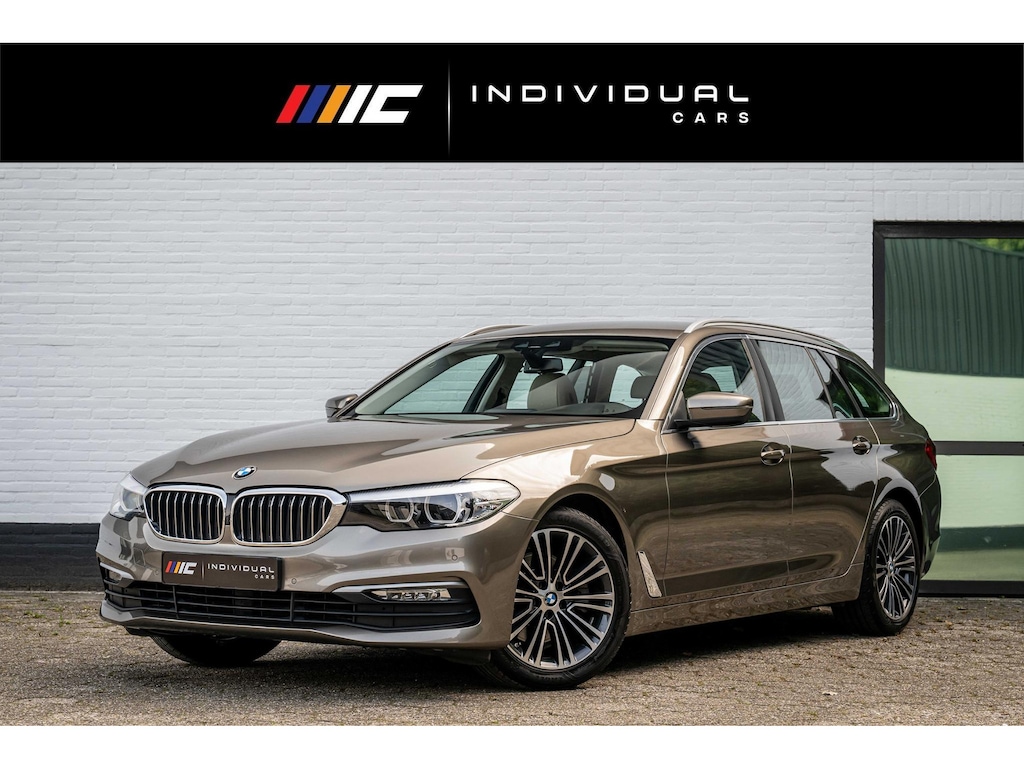 BMW 5-Serie Touring 520i Executive Leder Trekhaak LED Orig NL Auto