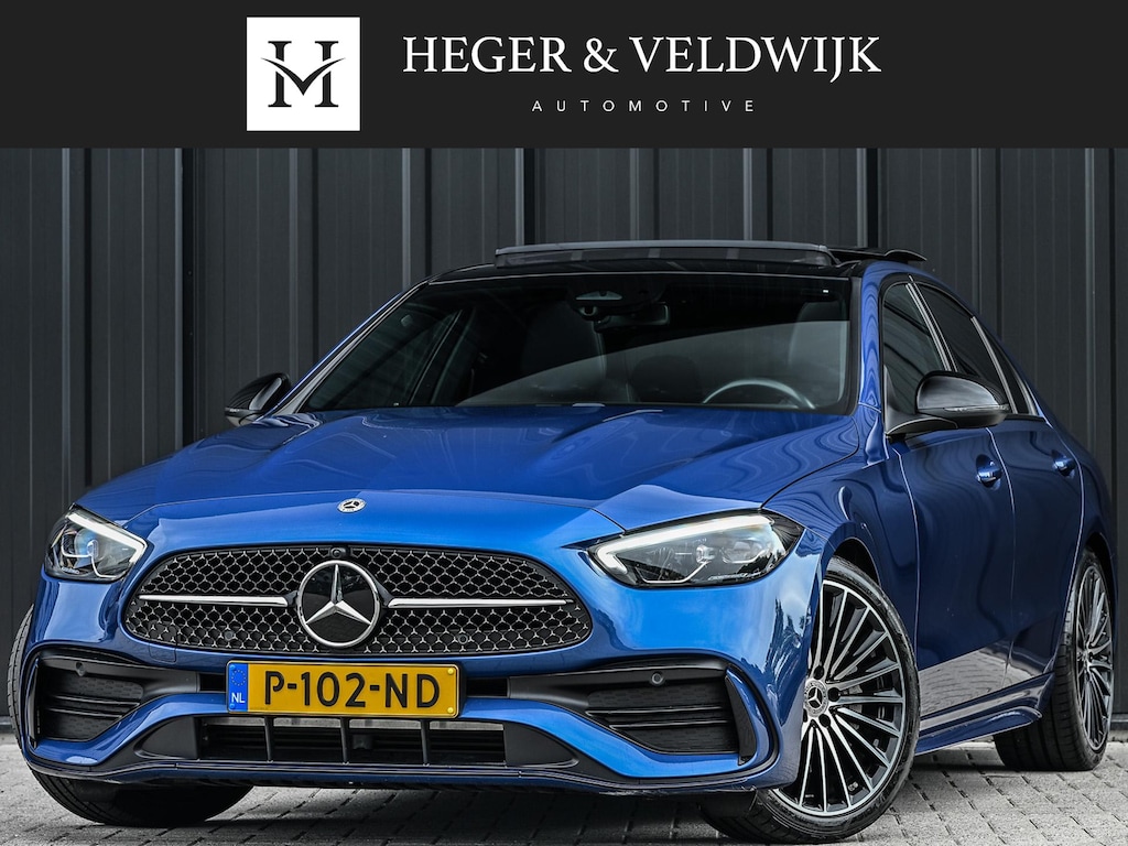 Mercedes-Benz C-klasse 180 AMG Line | NL-Auto | Panoramadak | Night-Pakket | Ambiance Interieur | Camera | Elektr. Verst. Voorstoelen + Verwarming |