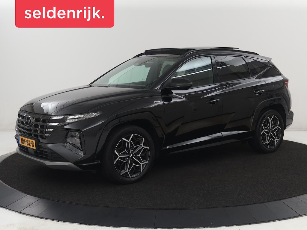 Hyundai Tucson 1.6 T-GDI PHEV N Line Sky 4WD | Pano | SOH 97,3% Stoelverwarming | Leder/Alcantara | Camera | Adaptive cruise | Carplay | Full LED | Stuurverwarming | Keyless | Plug In