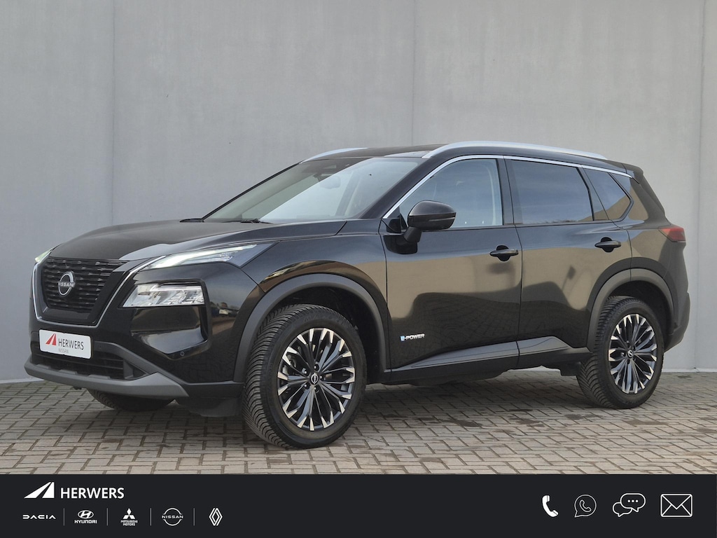 Nissan X-Trail 1.5 e-Power Tekna Automaat / Fabrieksgarantie tot 05-2028 / Dealer onderhouden / All Season banden / Stuur-, Stoel en Achterbank verwarming / Head Up Display / Elektrische achterklep / Rondomzicht camera / Adaptief CC /
