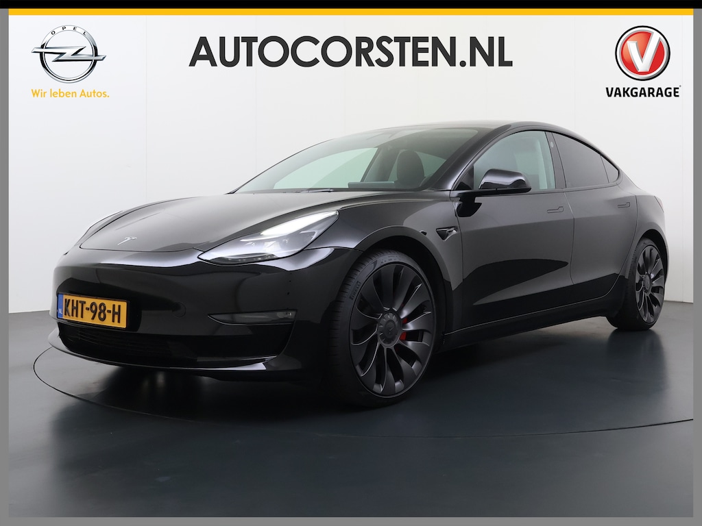 Tesla Model 3 Performance AWD 513PK Facelift Warmtepomp Lmv 20" Panoramadak Adap.Cruise Elek.Verwarmde Stoelen+Memory Inductieladen Navi Camera's Ecc Leder SOH 85.6% Led Pdc Privacy Glas Elek.Achterklep Keyless 4WD Fabrieksgarantie op Accu en Motor tot 18-02-2029/192.000KM