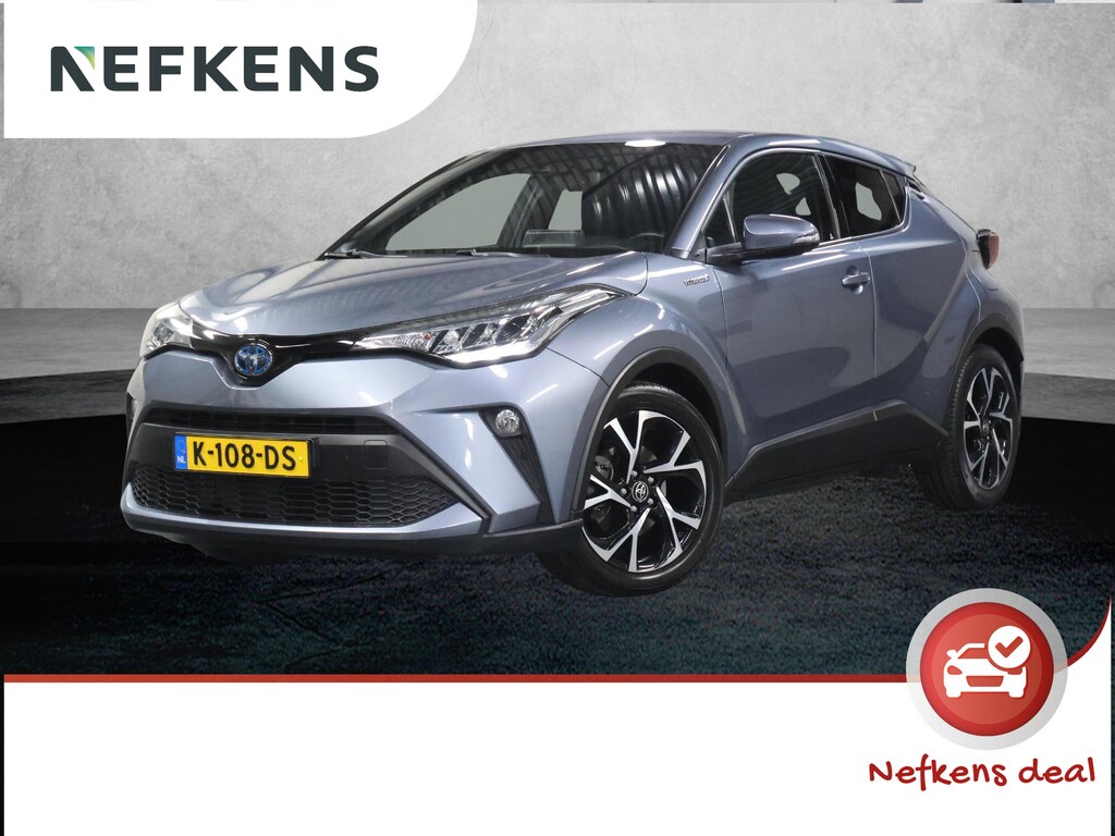 Toyota C-HR / C-HR+ 1.8 Hybrid Active | 1ste Eigenaar | AppleCarplay/AndroidAuto | Achteruitrijcamera | Trekhaak | Navigatie | Stuur en Stoelverwarming | LED koplampen | Cruise control | Isofix | Privacy Glass | Parkeersensoren |
