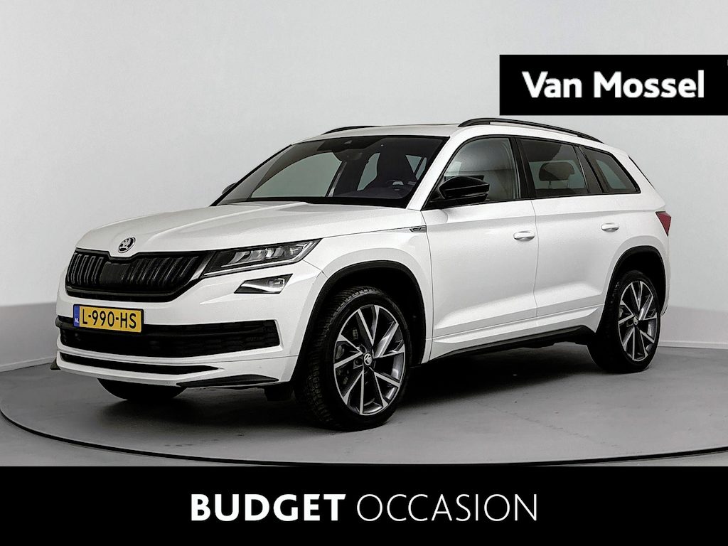 Skoda Kodiaq 1.5 TSI Sportline Business Airco | Achteruitrijcamera | Alcantara Bekleding | Trekhaak Uitklapbaar |  Sportline |  DSG | Cruise Control | Electronic Climate Control | Elektrisch Verstelbare Stoelen | Navigatiesysteem | Parkeersensor Voor en Achter | Stuurwiel Multifunctioneel | Stoelverwarming | Glazen Panoramadak