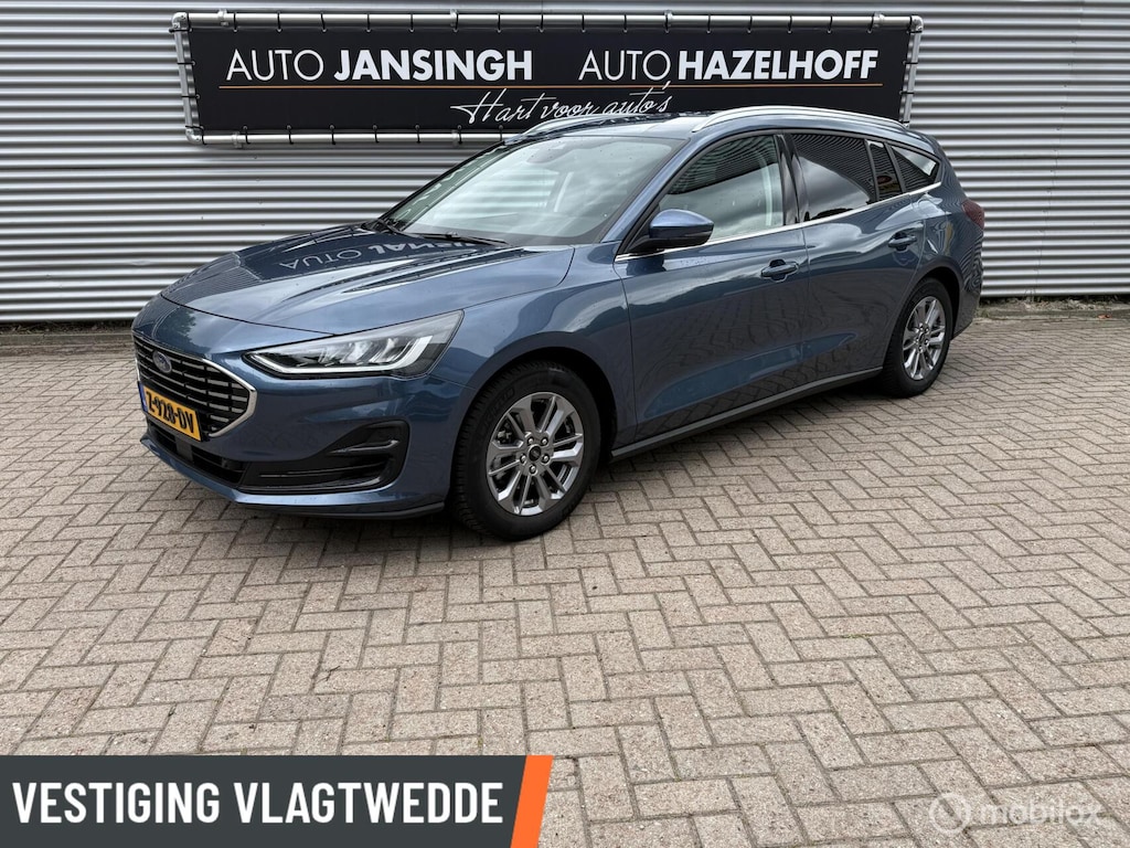 Ford Focus Wagon 1.0 EcoBoost Hybrid Titanium | Clima | PDC V+A | Navi | Privacy Glas | Cruise | Led |